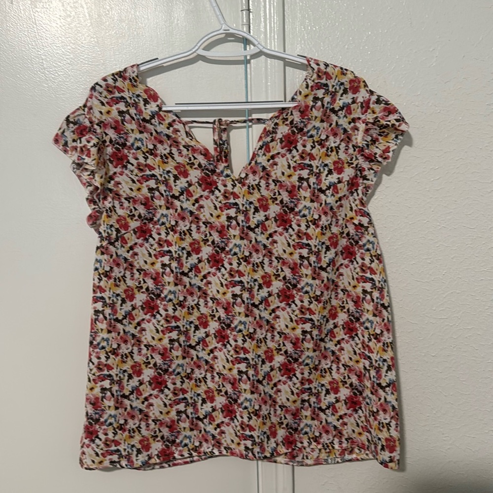 Brand new woman’s blouse never worn once.